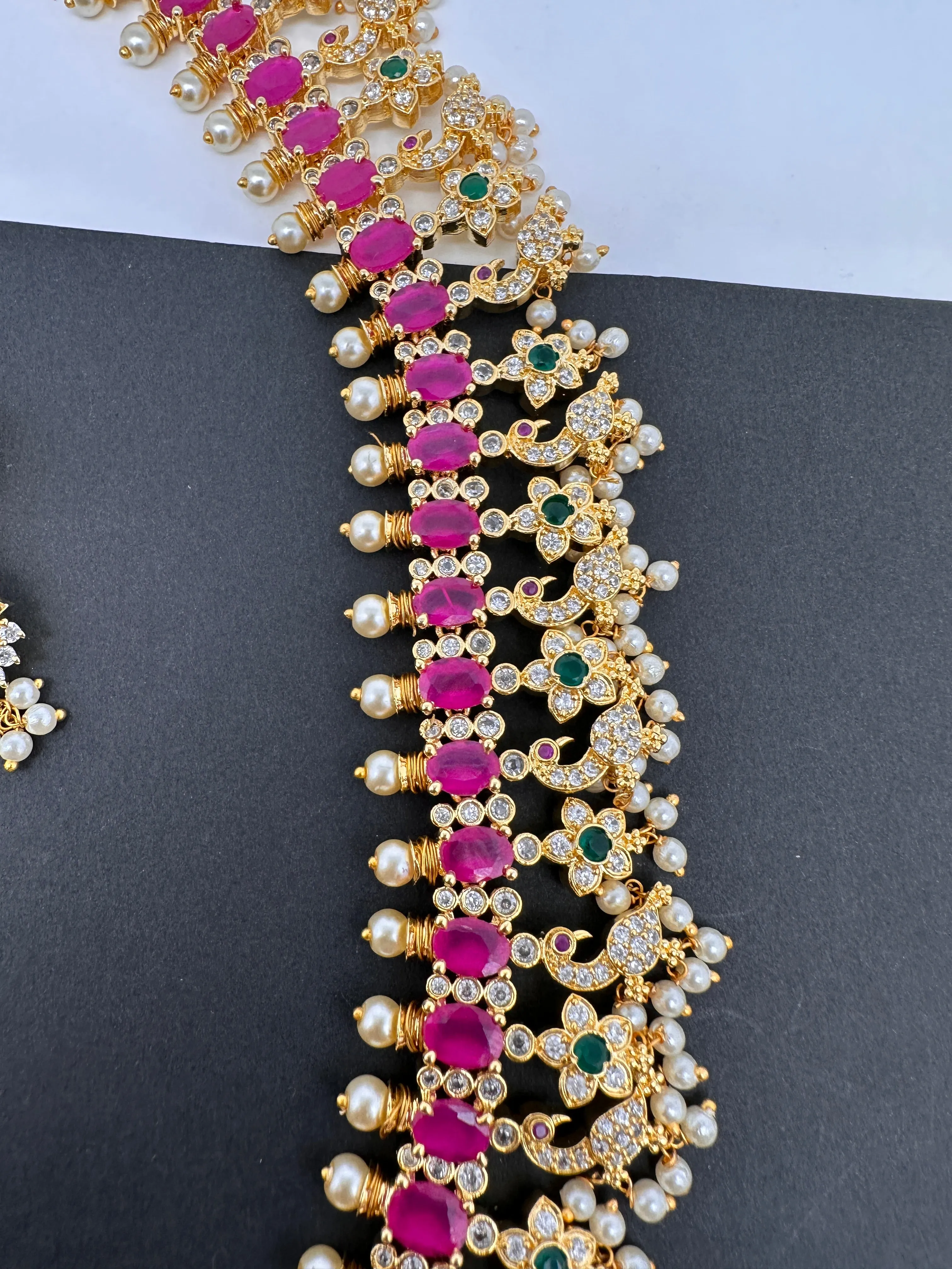 AD Ruby Red Stone Peacock Design Golden Finish Long Necklace